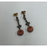 A pair of Antique diamond and coral earrings. Appr