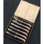 A cased set of six pistol handled knives. Est. £15