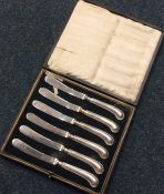 A cased set of six pistol handled knives. Est. £15