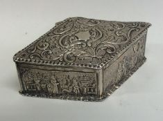 A stylish silver box decorated with figures and hi