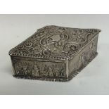 A stylish silver box decorated with figures and hi