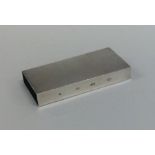 A modern silver match case of rectangular form. Lo