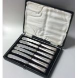 A cased set of six silver handled cake knives of t