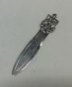 A Continental silver bookmark mounted with a figur