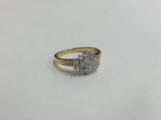 An attractive good quality diamond cluster ring in
