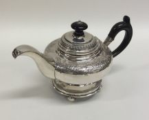 A good quality Danish silver teapot decorated with