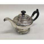 A good quality Danish silver teapot decorated with