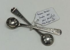 A pair of bright cut silver salt spoons. London 18