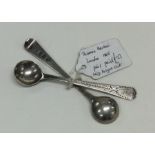 A pair of bright cut silver salt spoons. London 18