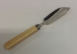 A Georgian silver butter knife. London. By WK. App