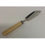 A Georgian silver butter knife. London. By WK. App