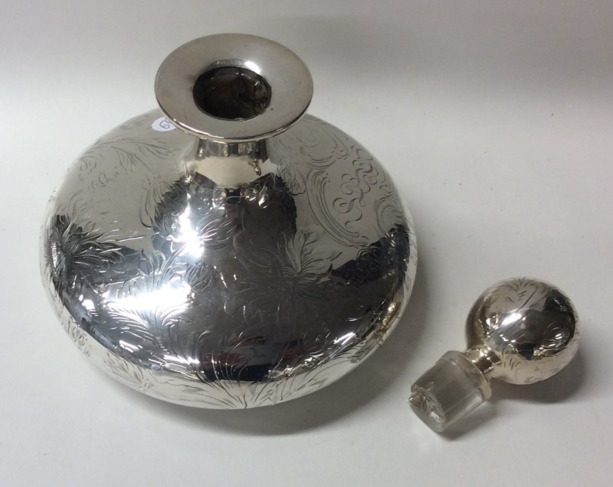 A circular silver and glass overlaid scent bottle - Image 2 of 2