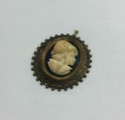 An unusual ivory cameo of a gent mounted in gilt f