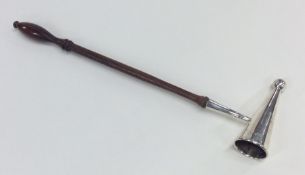 An unusual Edwardian silver candle snuffer with tu