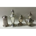 Four various silver condiments. Various dates and