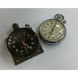 A Heuer aircraft dial together with a stopwatch. E