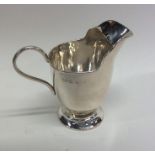 A small silver Adams' style cream jug. Birmingham.