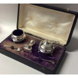 A cased silver three piece cruet. Birmingham. Appr