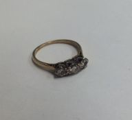 A good diamond three stone ring in 18 carat and pl