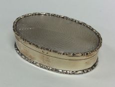 A good quality oval silver dressing table box. Bir