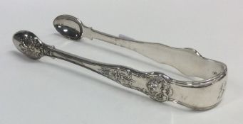 A heavy pair of Kings' pattern silver sugar tongs.