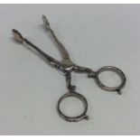 A pair of Antique silver sugar scissors of typical