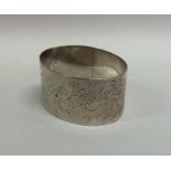 An Edwardian engraved silver napkin ring. Approx.