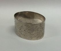 An Edwardian engraved silver napkin ring. Approx.