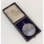 A cased Victorian silver medallion dated '1848'. A
