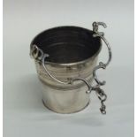 A Continental tapering silver pail with scroll dec