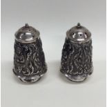 A pair of good quality Indian silver peppers decor