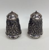 A pair of good quality Indian silver peppers decor