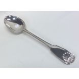 A fiddle, thread and shell silver basting spoon. L