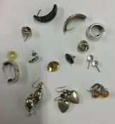 A bag containing silver earrings etc. Approx. 55 g