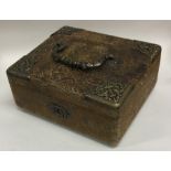 A leatherette jewellery box with brass mounts. Est