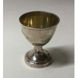 A Georgian silver egg cup on spreading foot. Appro