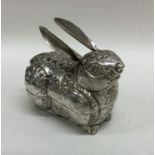 An unusual silver model of a hare with embossed bo