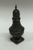 An embossed silver pepper. Birmingham. Approx. 42