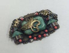 A stylish Chinese rectangular brooch decorated wit