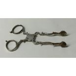 A pair of Antique silver sugar scissors of shaped