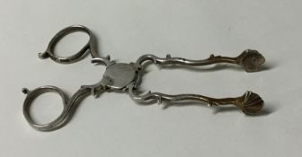 A pair of Antique silver sugar scissors of shaped