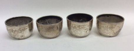 A set of four Victorian silver engraved salts. Lon