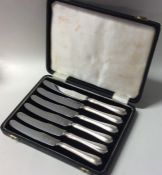 A cased set of six silver handled cake knives of t