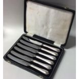 A cased set of six silver handled cake knives of t