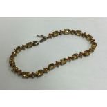 A 9 carat citrine line bracelet. Approx. 6.2 grams