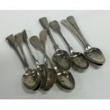 A collection of silver fiddle pattern teaspoons. V