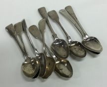 A collection of silver fiddle pattern teaspoons. V