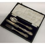 A good cased silver three piece christening set. L