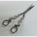 A pair of Dutch silver scissors with shaped handle