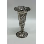 A Dutch silver flower vase decorated with figures.